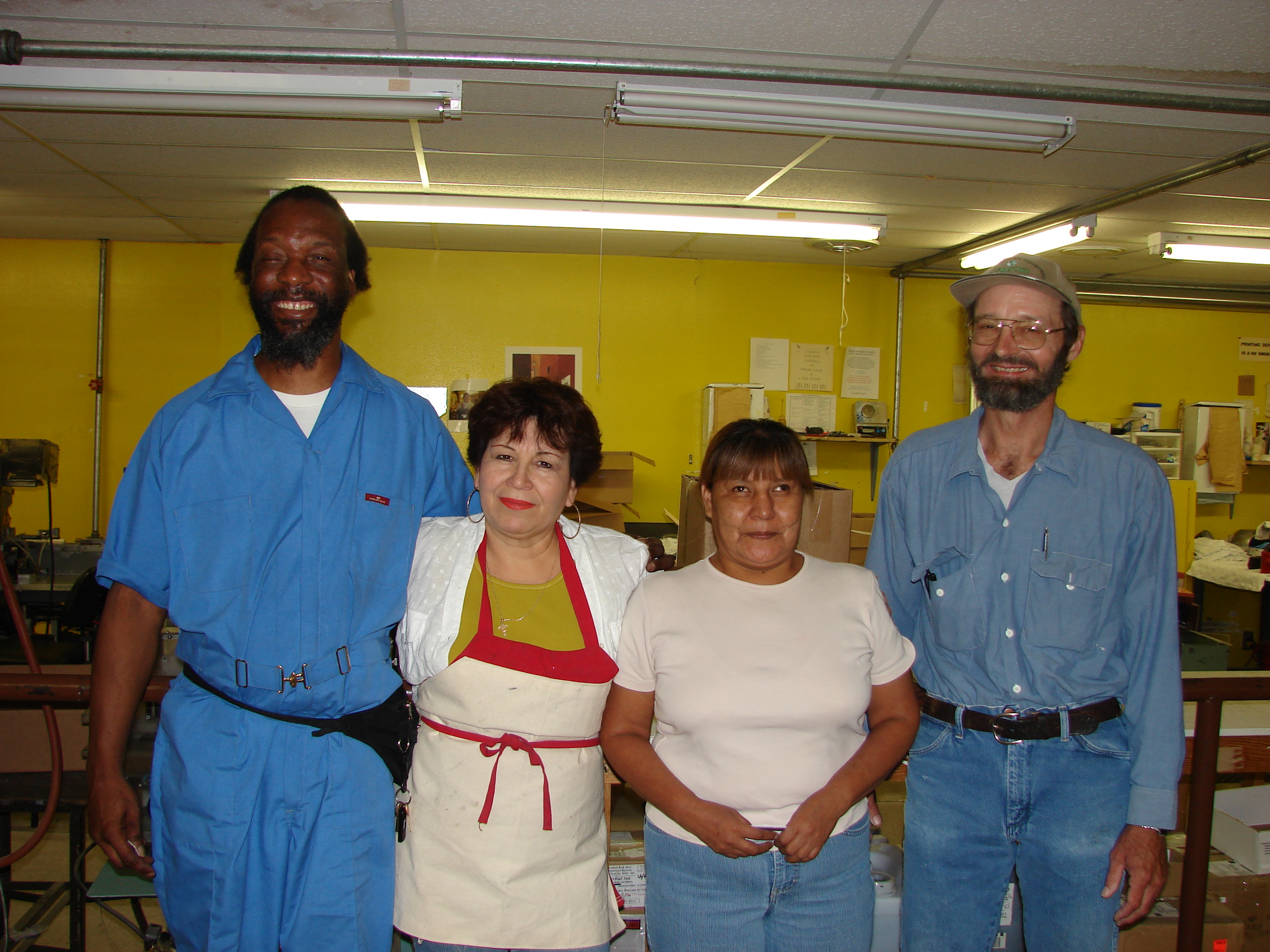 Kevin, Mary, Helen, and Scott celebrating perfect attendance.